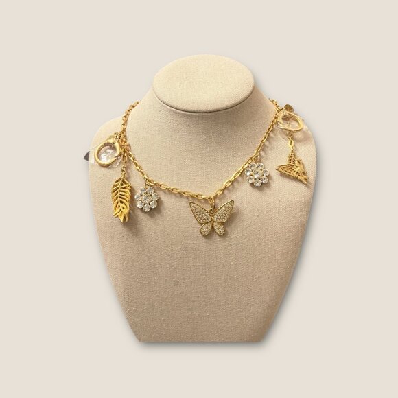 Gold-Tone Purse Charm With Butterfly & Floral Crystal Accents - Picture 1 of 5